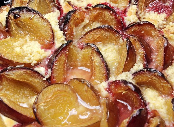 En quoi le four au bois est-il conseillé pour cuire une tarte flambée ?